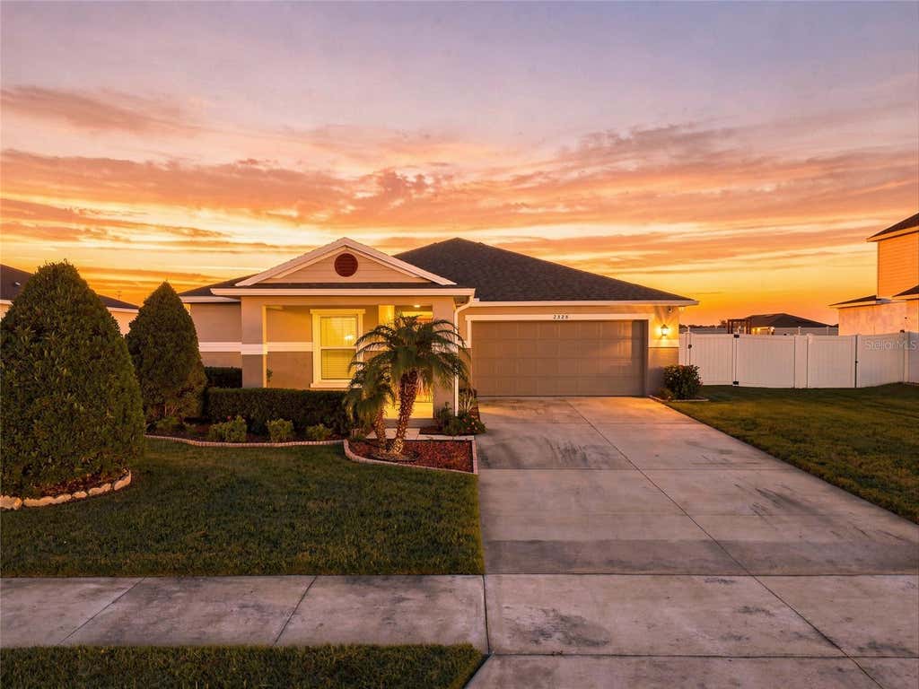 Photo of 2328 Carriage Pointe Loop, Apopka, FL 32712 (MLS # O6434078)