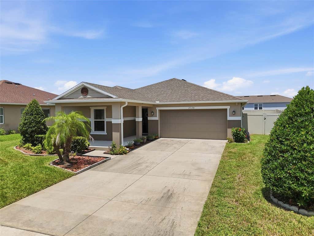 Photo of 2328 Carriage Pointe Loop, Apopka, FL 32712 (MLS # O6434078)