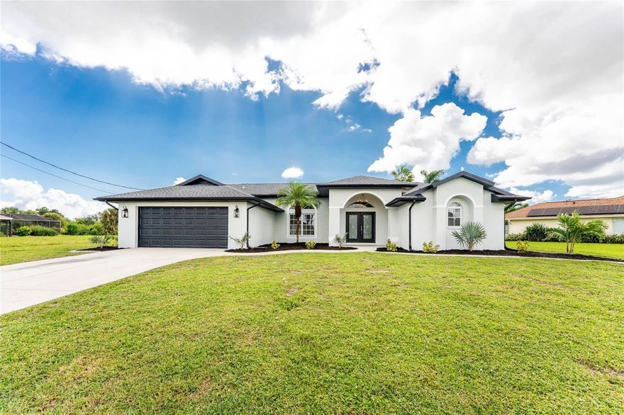 Welcome to this stunning, FULLY REMODELED home located in the highly sought-after community of Rotonda West. This beautifully updated residence features 3 BEDROOMS, 2.5 BATHROOMS, and a versatile OFFICE/DEN, all situated on a spacious SPLIT FLOOR PLAN that offers both privacy and functionality. At the heart of the home is a show-stopping kitchen featuring a MASSIVE 14-FOOT ISLAND with sleek QUARTZ COUNTERTOPS and BACKSPLASH, perfect for meal prep, casual dining, and entertaining. The kitchen also boasts ALL-NEW STAINLESS STEEL APPLIANCES and stylish LED LIGHTING THROUGHOUT for a clean, modern feel.

The open living area flows effortlessly to the outdoor space through POCKET SLIDERS, revealing a large screened lanai and pool with a PRIVATE, WOODED GOLF COURSE VIEW. The PRIMARY SUITE is a true retreat, offering an SPACIOUS WALK-IN SHOWER, DUAL SINKS, a PRIVATE WATER CLOSET, and a luxurious SOAKING TUB, perfect for unwinding after a long day. Enjoy added convenience with a HALF POOL BATH directly off the lanai, plus an OUTDOOR SHOWER.

This home has been meticulously updated with a NEW ROOF IN 2022, NEW A/C IN 2021, and a NEW POOL PUMP IN 2025. It also features ALL NEW LANDSCAPING and has been FRESHLY PAINTED INSIDE AND OUT, ensuring true MOVE-IN READY appeal.

Combining high-end finishes with everyday comfort, this exceptional home delivers luxury Florida living in a peaceful golf course setting. Best of all, you're just minutes from the white-sand beaches of BOCA GRANDE, ENGLEWOOD BEACH, and MANASOTA KEY, with easy access to WATERFRONT DINING, BOUTIQUE SHOPPING, and EVERYDAY CONVENIENCES, making this the perfect place to enjoy the Gulf Coast lifestyle.