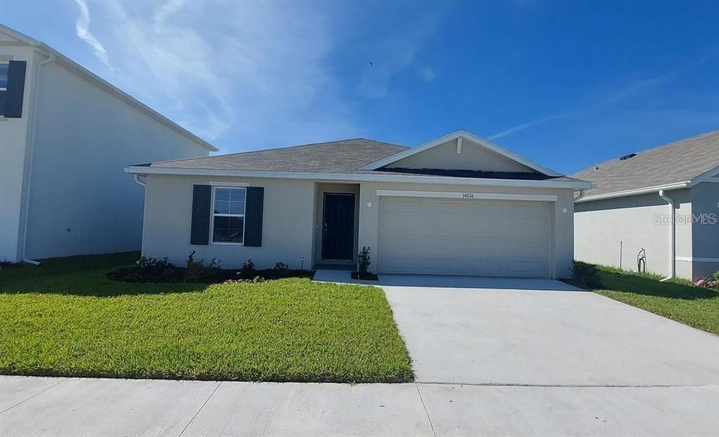 Photo of 34026 Soaring Bamboo Path, Wesley Chapel, FL 33543 (MLS # O6349350)
