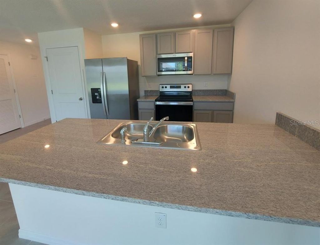 Photo of 34026 Soaring Bamboo Path, Wesley Chapel, FL 33543 (MLS # O6349350)