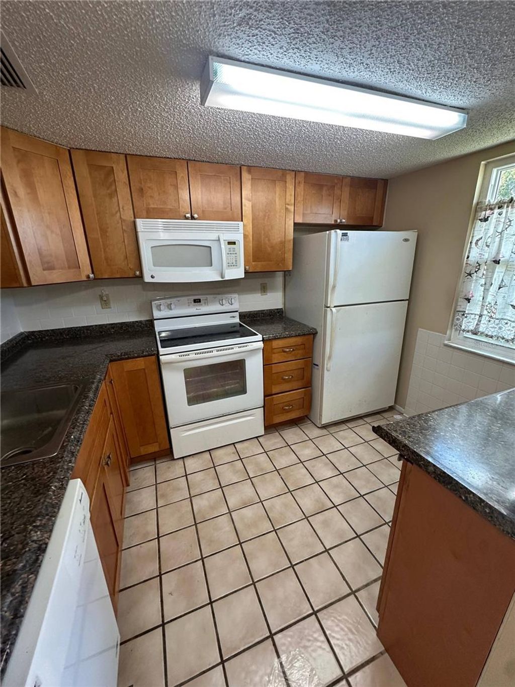 Photo of 11130 Carriage Hill Drive #4, Port Richey, FL 34668 (MLS # TB8435348)