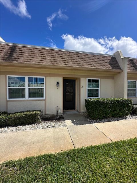 Photo of 11130 Carriage Hill Drive #4, Port Richey, FL 34668 (MLS # TB8435348)