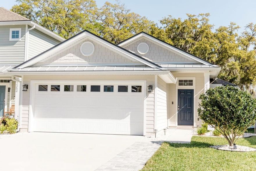 This home is truly no excuses or explanations when we say move in ready. Home is located in a newer gated community just minutes to Atlantic beaches restaurants, shops, and beautiful beaches. Loaded with upgrades throughout. Soft close white 42 inch kitchen cabinets and draws ,both bathrooms are also white soft close as well as laundry room cabinets. under cabinet kitchen lights, glass backsplash, stainless steel kitchen appliances, vented microwave to exterior of home, large granite island, both bathrooms match granite in kitchen, recessed lighting all bedrooms, closets, and main living areas. wide level 4 plank tile throughout entire home, crown molding throughout including laundry. No wire shelving in any closets, all custom closets. Commercial grade gorgeous epoxy garage floor, garage also has a large hanging rack for storage, hybrid hot water heater, whole house Culligan water system, and laundry room has front load washer and dryer. Frameless glass shower enclosures both bathrooms, no tubs. Sound insulation all walls in bathrooms, single handle chrome faucets with white square sinks, comfort height toilets, White plantation shutters all windows with Hunter Douglas blind on rear slider. Dan's fans all rooms and lanai  with remotes, gutters entire home.  All landscaping beds have aluminum edging, stone, no mulch or wood chips anywhere. White vinyl privacy fencing also has aluminum edging and stone for easy maintenance as well as crisp look. Gorgeous paver rear lanai and paver accents both side of wide driveway. Garage keypad, This home is also located on one of the best lots in this coastal oaks gated subdivision cul de sac in front and beautiful park like setting out your rear paver lanai. Nothing overlooked in this less than 2 year move in ready home with a lot of thought and design features. This home could not be built for this price today, don't wait. All information is intended to be accurate but is not guaranteed. ;Water: City