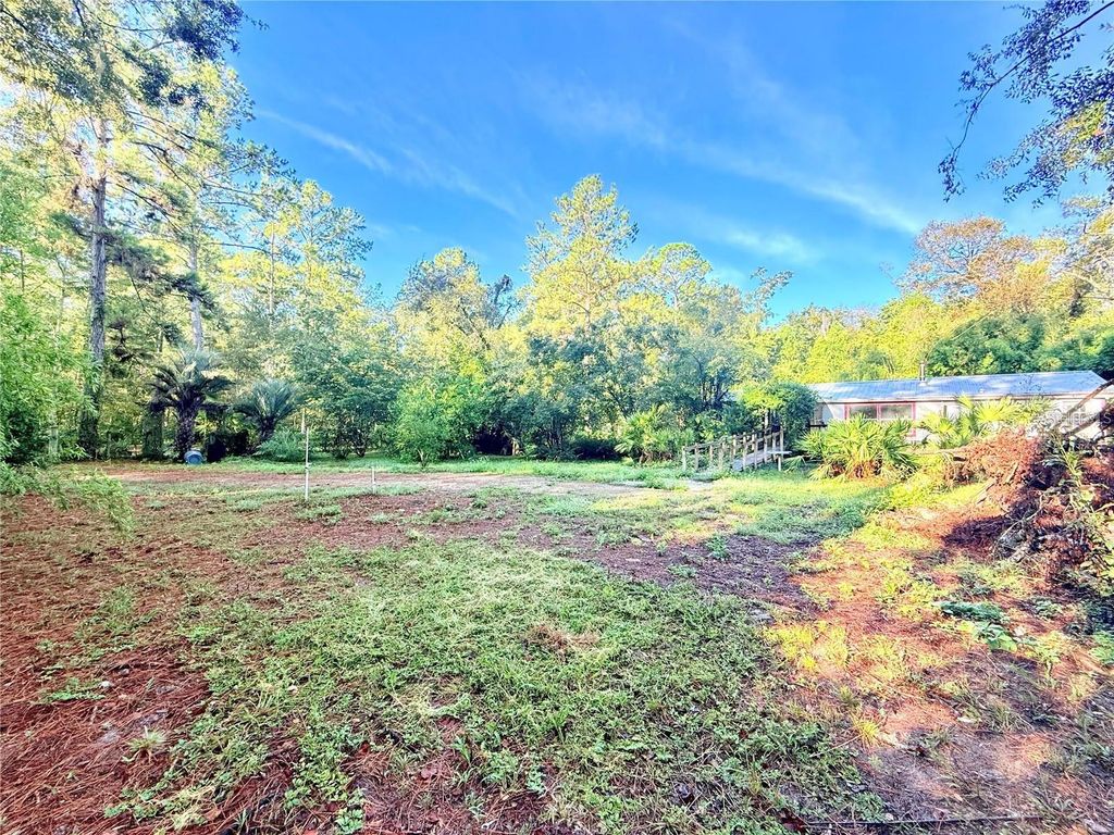 Photo of 7324 NW 152 Place, Alachua, FL 32615 (MLS # GC539086)