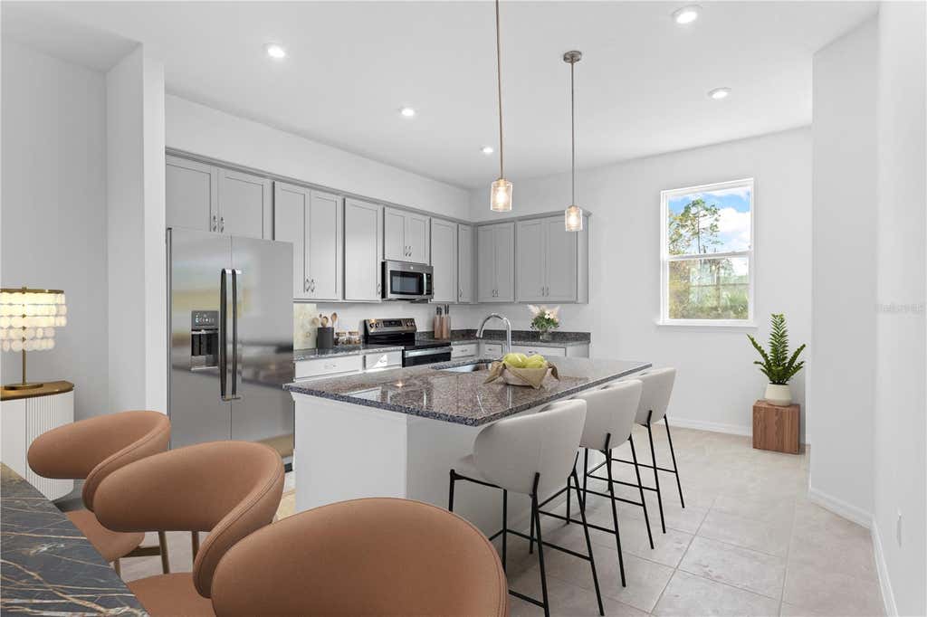 Photo of 9936 Tate Lane, Westchase, FL 33626 (MLS # TB8530684)