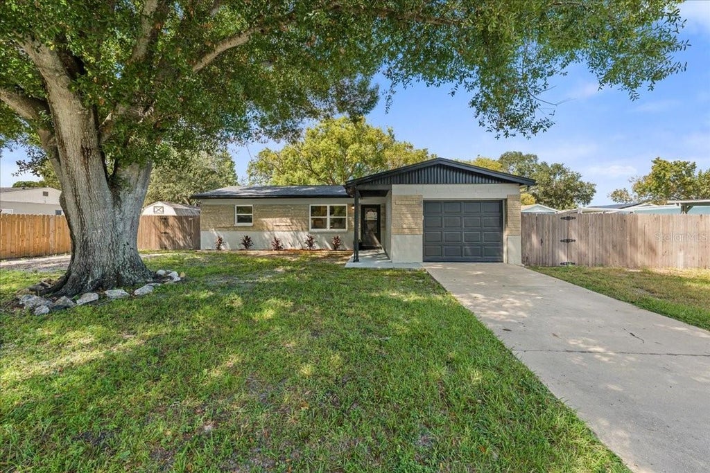 Photo of 14756 Mockingbird Lane E, Clearwater, FL 33760 (MLS # TB8554329)