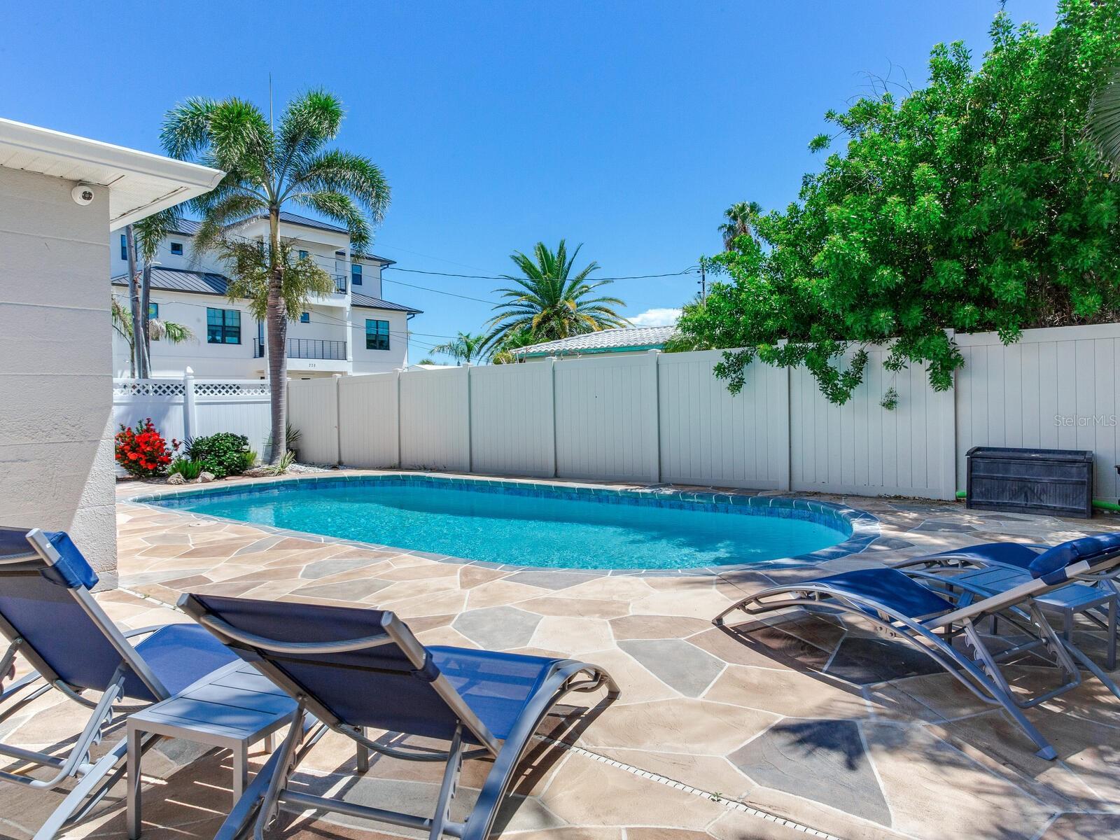 ESCAPE TO THIS CHARMING BEACH HOUSE WITH A PRIVATE POOL!! >>> perfectly nestled along the Intracoastal Waterway and just a short stroll to the white sandy beaches. This FULLY FURNISHED 3-bedroom, 2-bath home offers a cozy yet spacious layout—thoughtfully designed rooms that provide comfort and privacy. Enjoy modern finishes throughout, including a beautifully upgraded kitchen and stylish bathrooms. Step outside to your private backyard oasis featuring a sparkling pool—ideal for relaxing after a day at the beach. Whether you're seeking a peaceful seasonal escape or a long-term rental, this property offers flexibility with a minimum 3-month lease. Don’t miss the chance to live the coastal lifestyle with walkable beach access, and all the comforts of home.