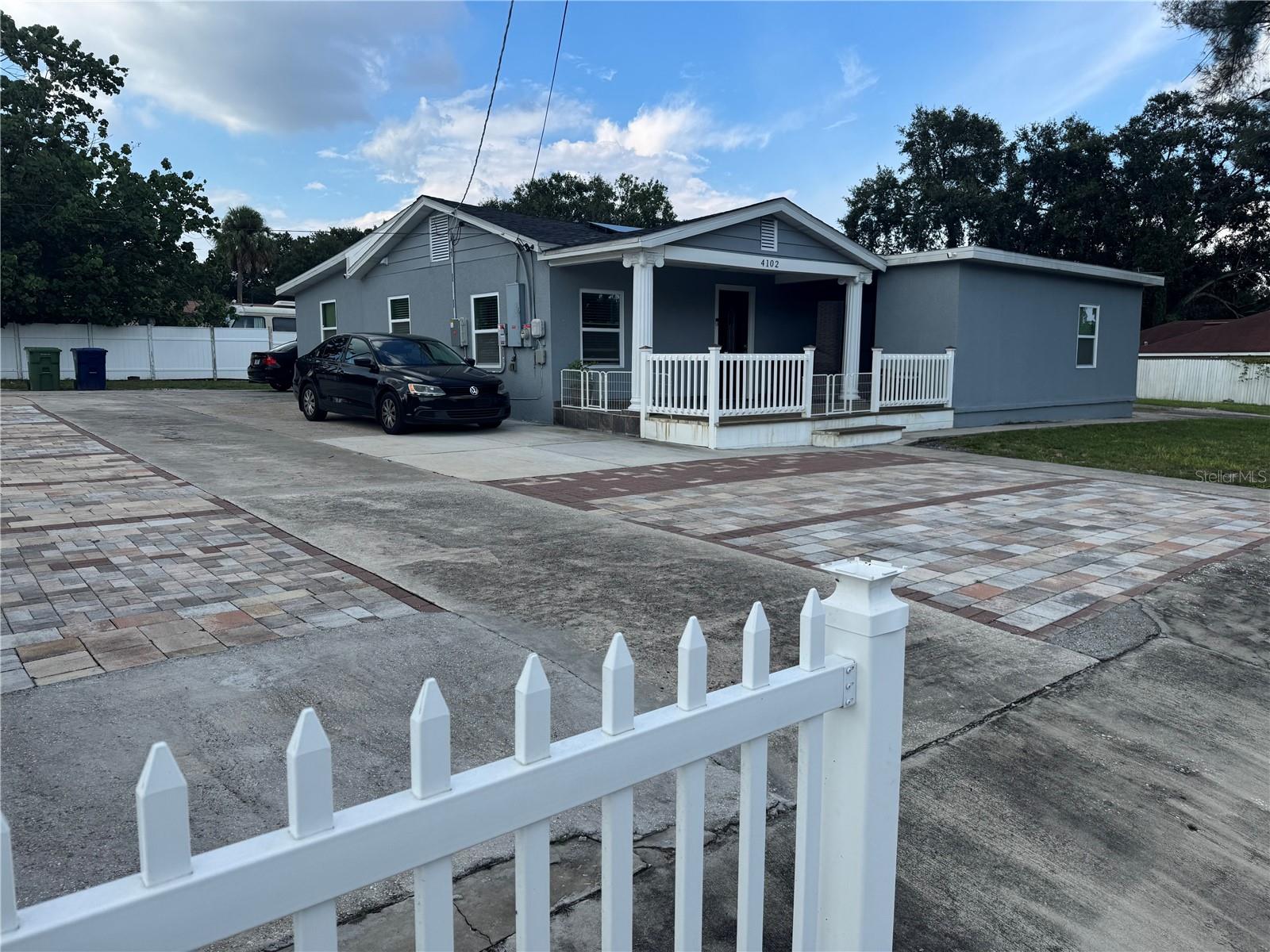 A single-family, one-story residence built in 1947, with approximately 1,724 square feet of living space and situated on a 0.32-acre (roughly 14,000?sq?ft) corner lot. It offers 4 bedrooms and 2 full bathrooms, and includes a variety of interior appliances such as a dishwasher, dryer, garbage disposal, microwave, range/oven, and refrigerator. The home features laminate flooring.
Exterior amenities include an attached garage, covered front and rear porches, chain link fencing, and additional structures like a shed and workshop