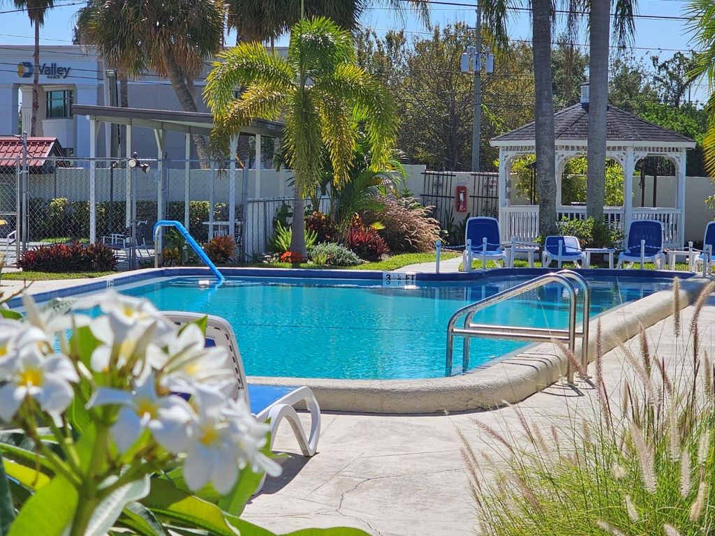 Photo of 1100 E Bay Drive #105, Largo, FL 33770 (MLS # TB8418861)