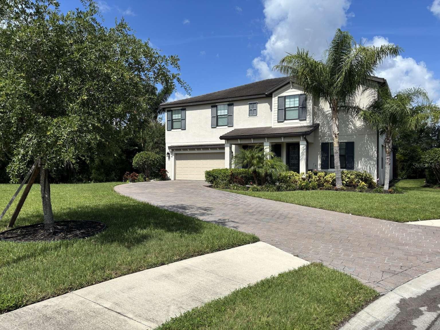 Unique & Rare Opportunity: Looking for space, privacy and convenience to everything, all while situated in a gated community? You've got to see this one. 5 bedrooms, 4.5 bath, 3,485 sq feet, on 1/3 of an acre, true corner lot, at the very end of the cul-de-sac. Welcome home to the quiet and quaint Copperleaf community just outside of Lakewood Ranch, but with all of the LWR amenities. This home was built in 2019, and features a 3.5 year old heated, saltwater pool with pebble Tec finish, a relaxing sun shelf, umbrella sleeve for shade in the pool, and spa for relaxing nights. Use your aqua app to remotely control the pool/spa temps and lights at any time. It's also equipped with an app to control your heating/cooling thermostat and Ring Doorbell from anywhere. This home has Eastern exposure, which means, you'll have all day fun in the sun for your pool as the back faces West. It features granite counters in the kitchen, butlers pantry and all bathrooms. As you open the front doors, you are greeted with 9'4 ceilings, formal living and dining room, crown molding throughout, with an expansive 20ft ceiling in the living room, adorned with decorative walls, and a sprawling chandelier, all open to the kitchen and eat-in-nook. The kitchen boasts ample cabinet space, a brand new Samsung French Door Refrigerator/2 freezer drawers, newer dishwasher and all stainless steel appliances. Step into a spacious walk-in Pantry the size of an elevator with custom shelving. The laundry room also has custom shelving and a newer washer. 3 bedrooms have ensuite bathrooms, as well as an enclosed bonus room with a full bathroom attached. The primary suite offers a HUGE walk in closet, a second closet for extras, a linen closet in the bathroom, with a full shower and separate soaking tub. The backyard has plenty of space to entertain on the pool deck, as well as a pergola sitting area and a large grass area to enjoy. The home is surrounded by an abundance of trees all the way around to provide a nice hedge for privacy. Once you're done enjoying the pool, open the door to your full pool bath to freshen up. The front porch also offers a nice place to sit and relax as well as more room to enjoy some activities in the front yard. The extra long driveway makes it easy for folks to find parking, accommodating roughly 6-8 cars. The house illuminates at night with landscape lighting to brighten up both the front and rear of the home. If you're looking for a small gated community, no CDDs, low HOA's, a very private lot with personal space, both inside and out - you have got to come see this for yourself. Owner/Sales Associate.