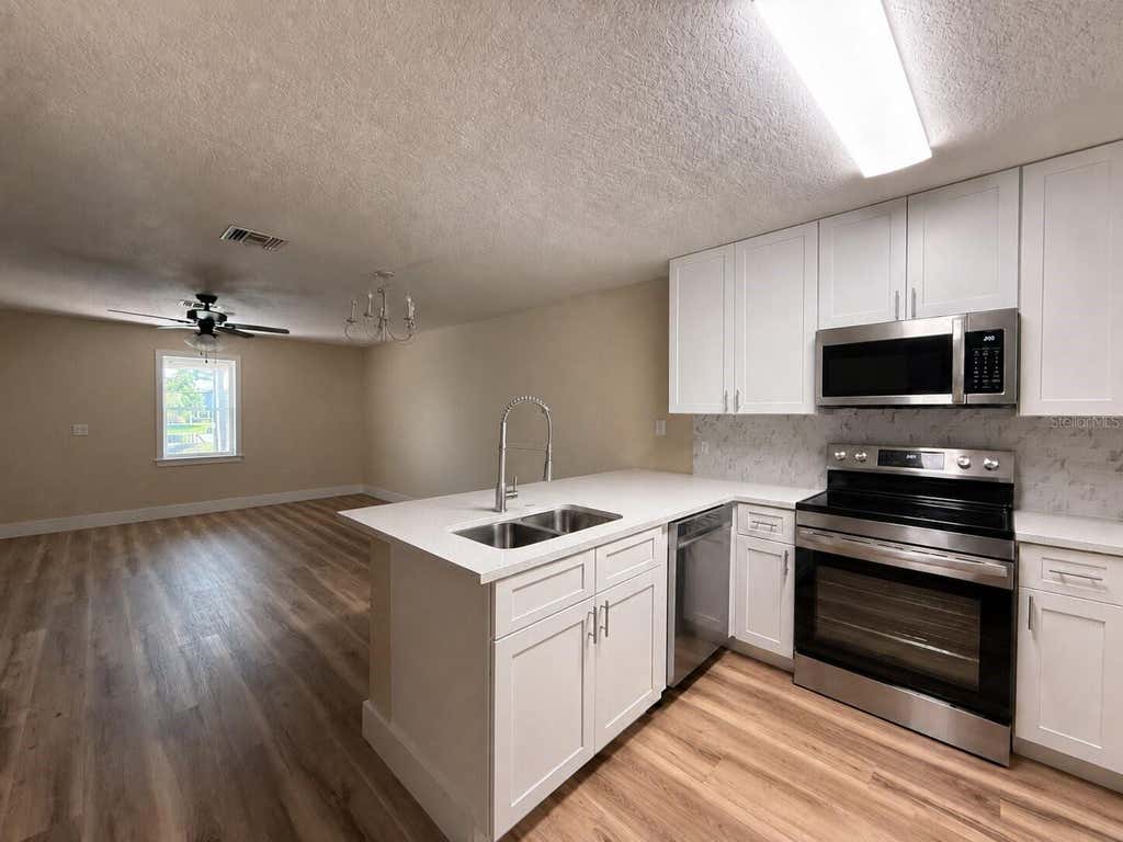 Photo of 12718 Somerset Oaks Street, Orlando, FL 32828 (MLS # O6419405)
