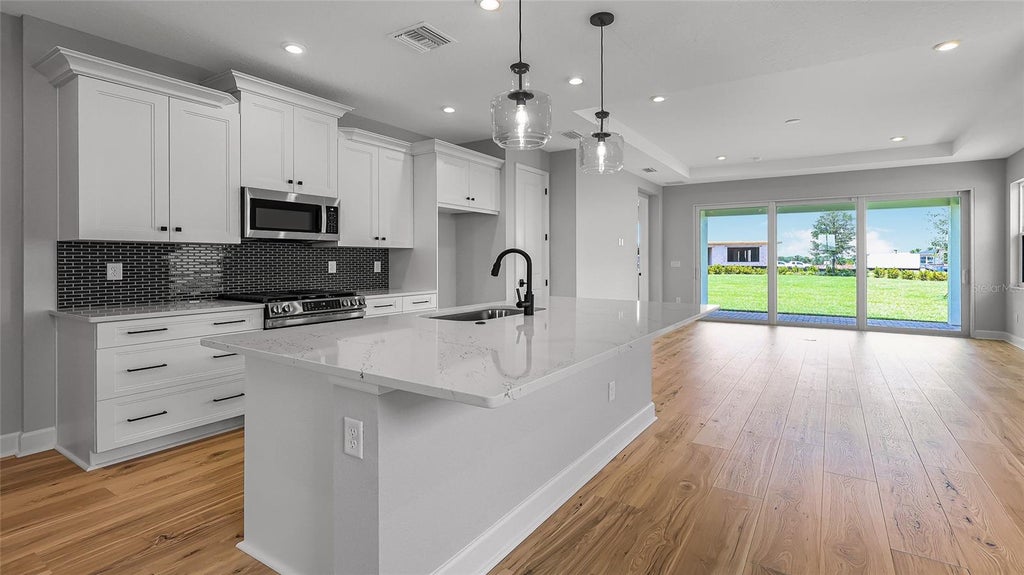 Photo of 1463 Santorini Way, Tavares, FL 32778 (MLS # W7889324)