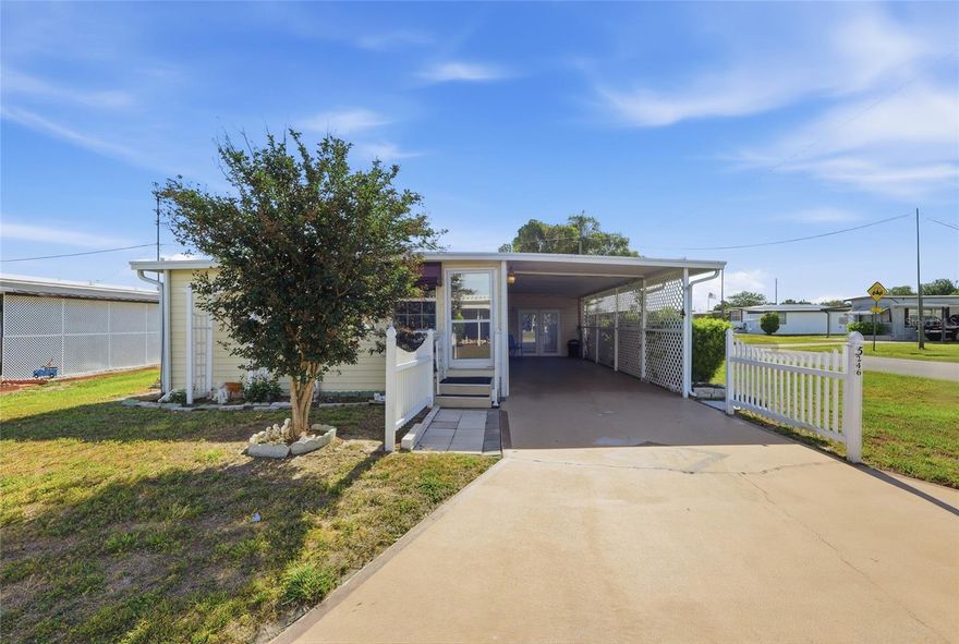 Welcome to this beautifully updated 2BR/2BA home on a desirable corner lot in the highly sought-after 55+ community of Betmar Acres—where you OWN your land! This fully furnished, move-in ready gem truly stands out among similar homes in the area, offering added space, functionality, and value. Step inside to a bright, inviting layout with an open feel, enhanced by a thoughtfully enclosed foyer that creates a charming sitting area perfect for relaxing or entertaining. The home features two convenient stand-up showers, a handicap-accessible ramp, and ample storage throughout, including a dedicated workshop—features not commonly found in comparable properties. Enjoy the ease of a complete turnkey experience—what you see is what you get, from furniture to dishes, linens, and more—just bring your suitcase and start living the Florida lifestyle! Located in sunny Zephyrhills, you’ll love the proximity to shopping, dining, medical facilities, and easy access to Tampa, while enjoying resort-style amenities including golf, pools, clubhouses, pickleball, shuffleboard, and a full social calendar. This is your opportunity to own a spacious, upgraded home in one of the area’s most active and welcoming communities—perfect for seasonal or full-time living!