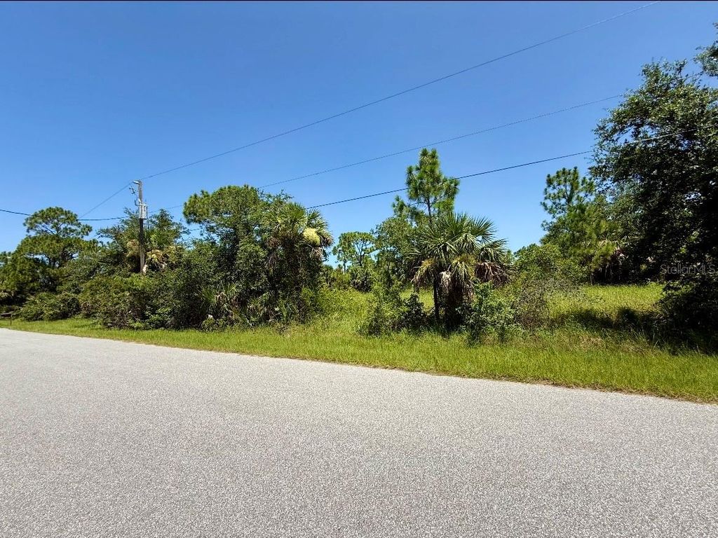 Photo of 14312 Mc Clellan Avenue, Port Charlotte, FL 33953 (MLS # C7512837)