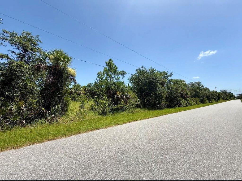 Photo of 14312 Mc Clellan Avenue, Port Charlotte, FL 33953 (MLS # C7512837)