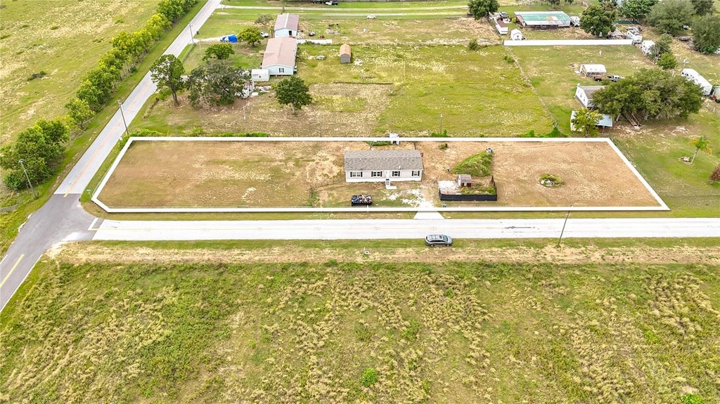 Photo of 1491 Alford Road, Haines City, FL 33844 (MLS # O6435518)