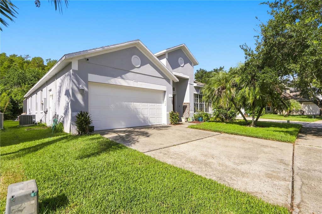 Photo of 1732 Nestlewood Trail, Orlando, FL 32837 (MLS # O6433362)