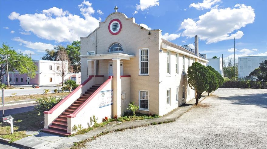 Discover a piece of Tampa's vibrant past at 953 E 11th Avenue, Tampa, FL 33605 – a well-preserved assembly building constructed in 1939, offering 5,040 square feet of versatile space on a spacious 0.45-acre lot (19,602 square feet). This property blends timeless charm with modern functionality, making it an ideal opportunity for community organizations, event venues, or creative redevelopment in one of Florida's most iconic neighborhoods.

Step inside this two-story structure, featuring four bathrooms, central air conditioning for year-round comfort, and a sturdy build on a slab foundation with crawlspace. The block exterior and shingle roof provide durability and low maintenance, while public utilities ensure seamless operations. Ample parking accommodates 19 to 30 vehicles, perfect for gatherings, services, or events. Whether you're envisioning a place of worship, community center, or adaptive reuse project, the open layout offers endless possibilities.

For potential buyers, this property shines with opportunity in a prime location near Hillsborough Community College's Ybor campus and the University of Tampa, attracting a steady flow of students, faculty, and visitors. Zoned for flexibility in a historic district, it could be transformed into a boutique event space, cultural center, or mixed-use development while preserving its heritage. With Ybor's ongoing revival – including trendy breweries, galleries, and festivals – investors can capitalize on rising property values and tourism, all while owning a slice of Tampa's storied history. Don't miss this chance to invest in a legacy property with boundless potential!