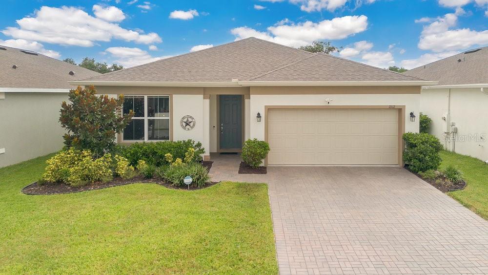 Welcome to 2112 Live Oak Lake Rd. St. Cloud Fl. **LOCATION! LOCATION! LOCATION! ** MOVE IN READY** Just within a mile of the Narcoosse Rd / 192 intersection, close to major highways, shopping, hospitals, Orlando International Airport, Beaches and Theme Parks. This immaculate maintained home sits on a private lot with no rear neighbors and preservation area as your back yard view from the oversized Patio. Lovely community with Pool, Playground, LOW Home Owners Association and NO cdd. Great School district! Upon pulling up to the home, you will notice the pavered driveway with lovely landscaping and St. Augustine truf. Entering the house you will notice the OPEN FLOOR PLAN, tall ceilings and 8ft doors, TILE FLOORS and CROWN MOLDING thoughout the house. All NEW light fictures, ceiling fans, new Utility sink, and electric operated custom made sliding door Blinds. KITCHEN features 42" upper cabinets with finished molding, CLOSET PANTY, KITCHEN ISLAND, STAINLESS STEEL appliances, lovely BACKSPLASH, and QUARTZ countertops. The Master Bedroom with backyard view features a BRAND NEW CUSTOM MADE CLOSET. Master bath has DUAL SINKS AND QUARTZ vanity along with large walk in shower. SCHEDULE YOUR SHOWING TODAY! <div style="padding:56.25% 0 0 0;position:relative;"><iframe src="https://my.matterport.com/show/?m=54Ssm8k3msG&mls=1" frameborder="0" allow="autoplay; fullscreen" allowfullscreen style="position:absolute;top:0;left:0;width:100%;height:100%;"></iframe></div>