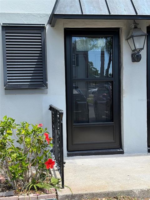 Photo of 6919 Place De La Paix #6919, St Petersburg, FL 33707 (MLS # TB8495121)