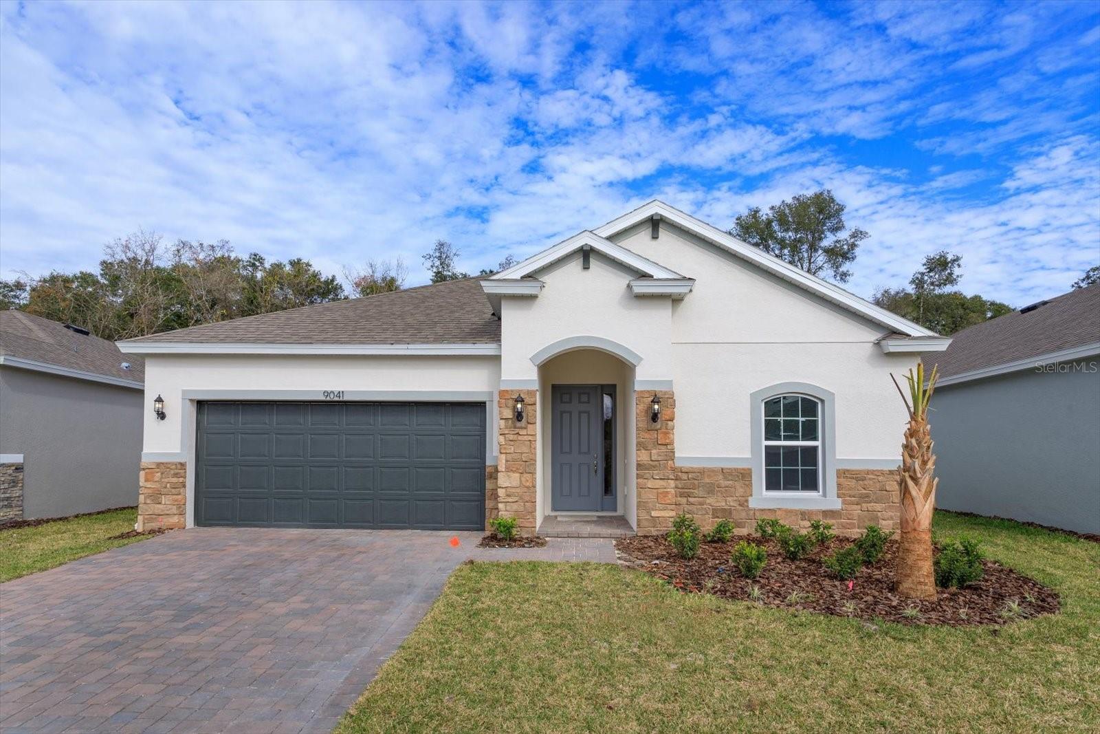 Introducing the Mulberry B 1,938-square-foot single-story in Seaport Village community Tavares.
This well-appointed 4-bedroom, 2-bath, 2-car garage home has a spacious open-concept living space. The kitchen features 42" Stone Cabinets
with Quartz Counter Tops and upgraded laminate flooring in the living areas. As part of Seaport Village, residents enjoy easy access to local
amenities, including shopping Publix and dining in historic downtown Tavares, nearby nature trails, and golf courses. The community's convenient
location near major highways ensures easy connectivity while maintaining a cozy suburban setting.