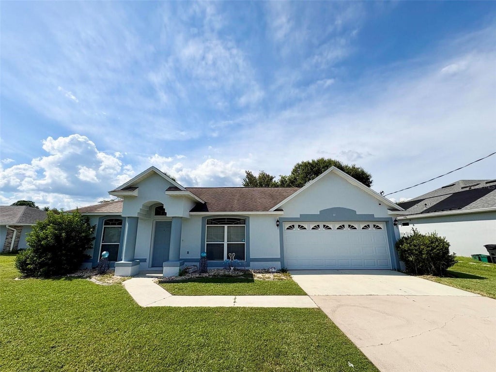 Photo of 68 Baltimore Lane, Palm Coast, FL 32137 (MLS # O6446126)