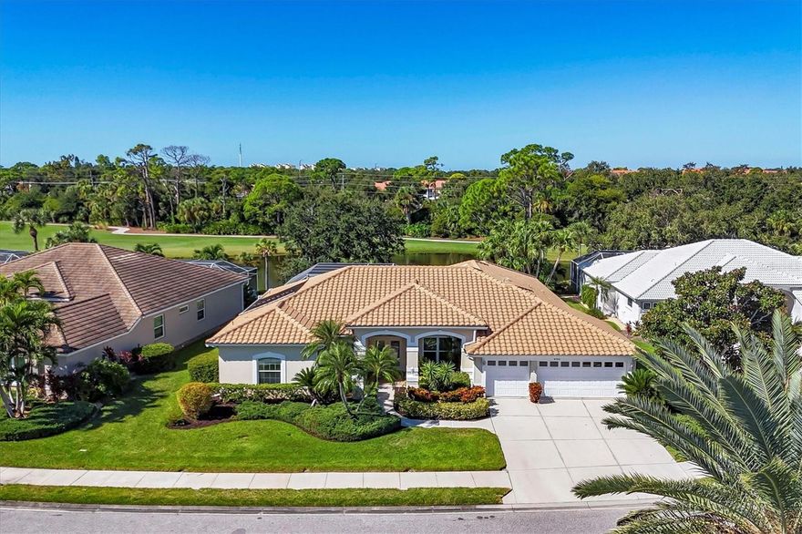 Welcome to a home that perfectly blends comfort, style, and Florida living. This beautifully maintained 2,794 sq. ft. residence offers 4 bedrooms, 3 baths, a den, and generous gathering spaces designed for both relaxation and entertaining. From the moment you step through the double etched-glass doors, you’re greeted by captivating views of the pond and golf course — setting the tone for everything this home has to offer. The foyer is framed by the formal dining area, cozy living room, and a versatile den — ideal for a home office or quiet retreat. The open-concept design connects the spacious kitchen and great room, creating a natural flow for everyday living and entertaining. The kitchen itself is extra large and thoughtfully designed, offering plenty of prep and storage space for the home chef. Step through sliding glass doors to the expansive lanai — the true heart of this home. Here, a sparkling pool and spa overlook tranquil water and golf course views. With both covered and open-air seating areas, this space invites you to enjoy everything from morning coffee to sunset cocktails in total privacy. The primary suite is a serene retreat featuring two large closets and a spa-inspired ensuite bath with dual vanities, a soaking tub, and a walk-in shower. Both vanities have been tastefully updated with quartz countertops, rectangular sinks, and brushed gold fixtures. The split floorplan provides privacy for family and guests, with three additional bedrooms and two full baths. For peace of mind, the home is equipped with high-impact windows, accordion-style hurricane shutters, and a new tile roof installed in 2018. The interior has been freshly painted in a soft, neutral palette, creating a bright and inviting atmosphere throughout. Whether you’re hosting friends, enjoying quiet evenings by the pool, or simply soaking in the views, this home offers the best of Florida’s indoor-outdoor lifestyle — your very own private oasis. As a bonus the seller has paid the golf assessment in full, saving you $812 per year for the next 9 years.