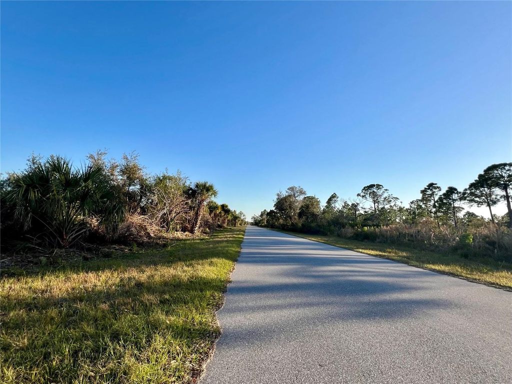 Photo of 14113 Magness Avenue, Port Charlotte, FL 33953 (MLS # C7524909)