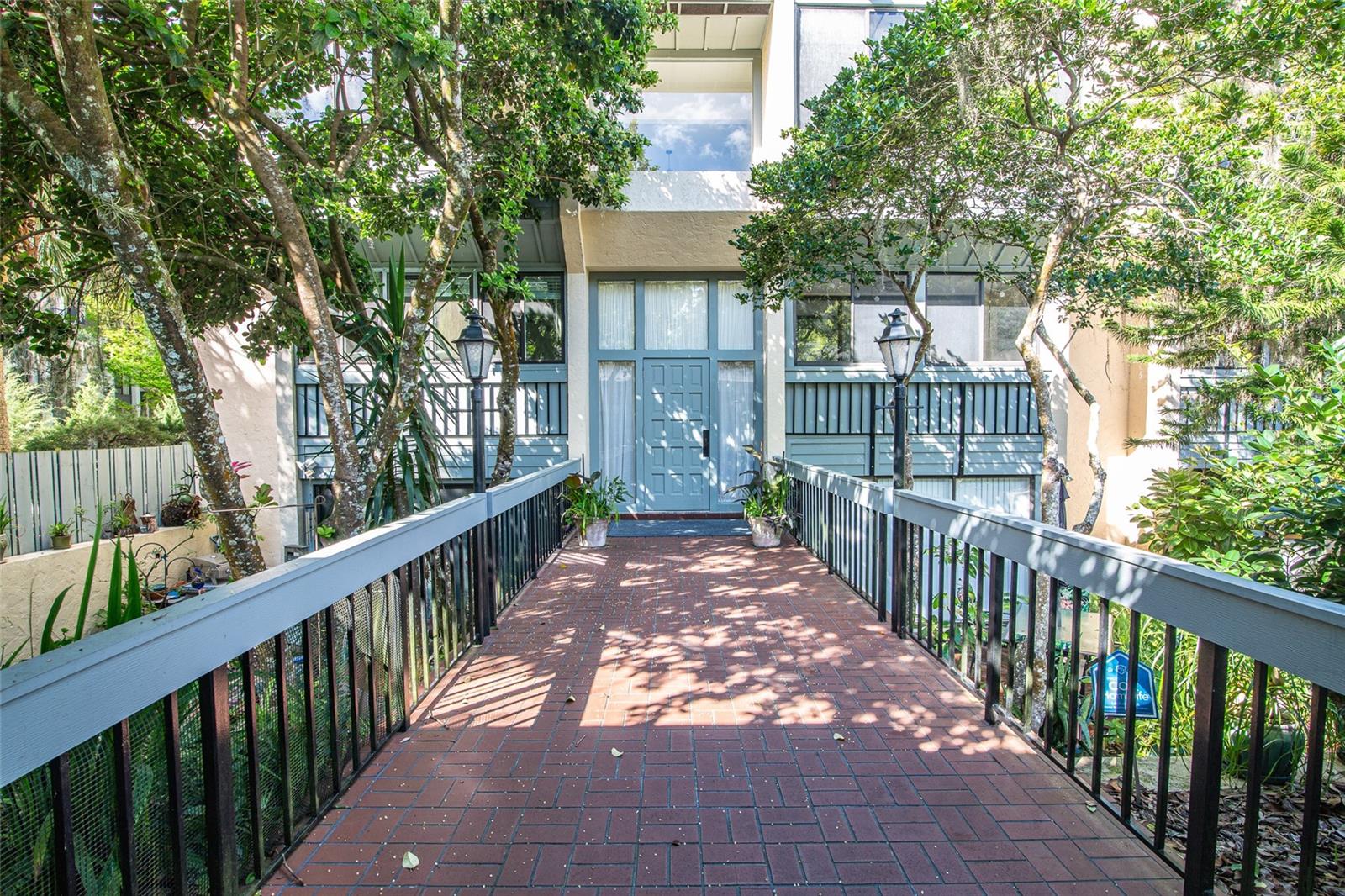 If lake access and gorgeous sunsets are appealing to you, this Bivens North condo might be just what you need! This 2-bedroom, 1.5 bathroom condo has a large Florida room facing Biven’s Arm and when the weather is nice, you can open both sets of sliding doors to expand your living space. The lake views are absolutely beautiful, and the grounds give you that lake life without the chores. This condo is ready for someone to take that next step and customize it to their style and it has been priced with that in mind. There is plenty of guest parking as well as a garage spot with a large storage area. On the lakeside there is a clubhouse, sparking pool with a view, a dock for relaxing, and kayak/canoe storage right next to the water. Bivens North is a hidden gem providing a rare lakeview in Gainesville and is very close to UF Health, the VA, the Veterinary School, and retail. Make an appointment to see if you would like to be the next owner!