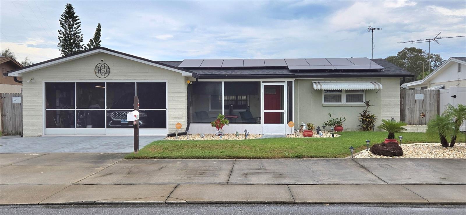 Welcome to this beautifully maintained 3-bedroom, 2-bath home offering 1,284 sq. ft. of comfort and updates throughout! Peace of mind comes easy with a new roof (2023), a 3-ton Lennox AC system (2018) with a 10-year warranty and digital thermostat, a 2-year-old water heater, newer electrical, and new hurricane-rated windows with hurricane shutters. The home is completely tiled for easy maintenance and features an updated kitchen, fresh paint, and spacious bedrooms.
Enjoy Florida living with a front-screened porch, outdoor shower, and nicely landscaped yard. The property also includes solar panels (leased) for energy efficiency. The garage is equipped with screen doors, and there’s ample parking with extra pads—perfect for guests or multiple vehicles.
Best of all, this home is located in a non-flood zone (no flood insurance required) and is just minutes from the beaches, shopping, dining, and vibrant nightlife.
Perfect for first-time buyers, retirement, or vacation living, this move-in ready home combines modern comfort with an unbeatable location!