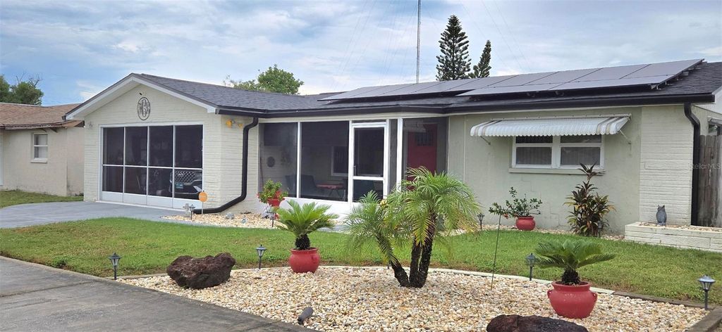 Photo of 3111 Kilburn Road, Holiday, FL 34691 (MLS # W7878400)