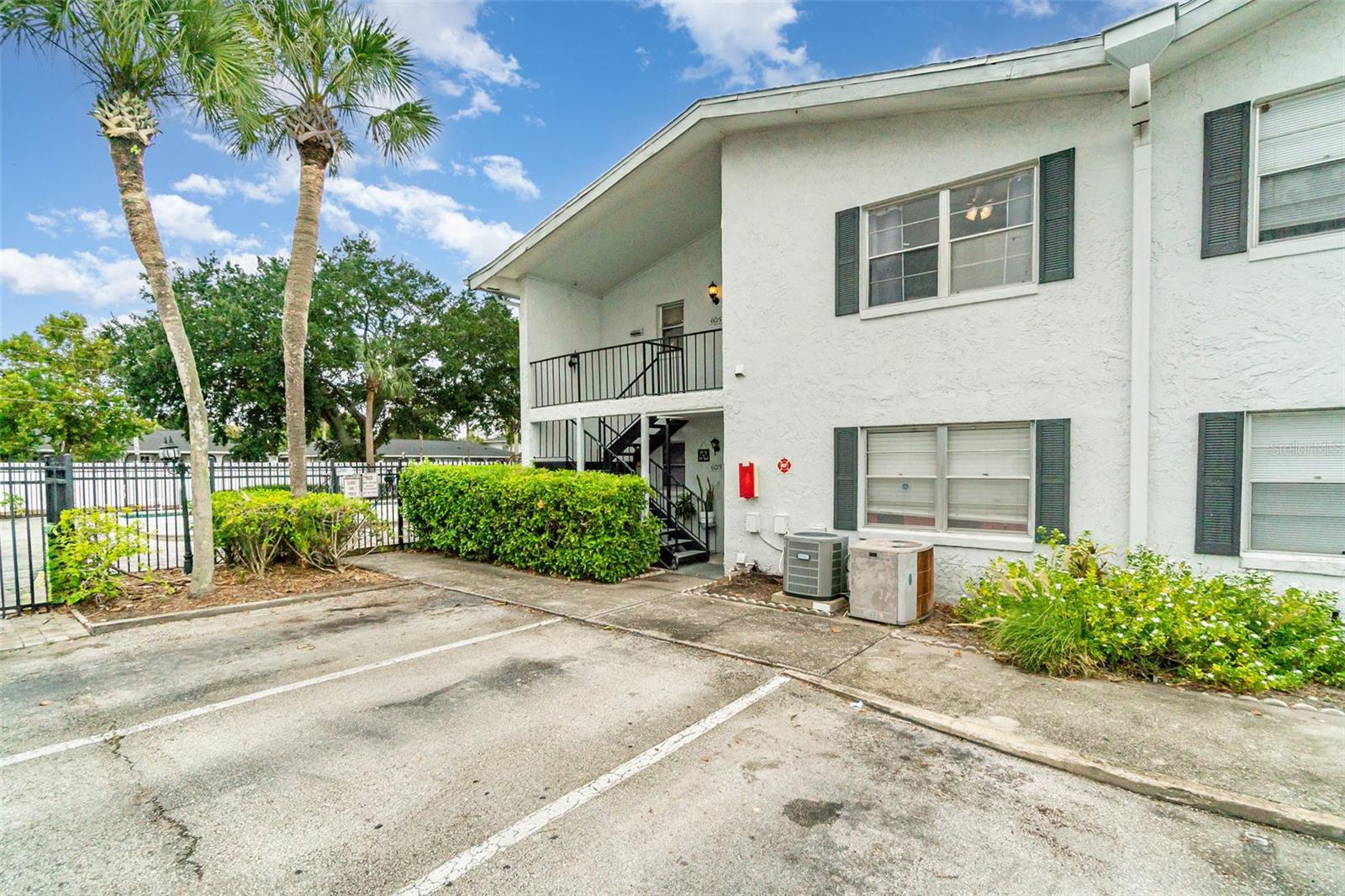 One or more photo(s) has been virtually staged. 2-Bedroom Condo in Villa Marquis – Orlando
Welcome to this 2-bedroom, 2-bath upstairs condo in the heart of Orlando’s Conway area. Offering 1,034 square feet of living space, this home combines comfort, convenience, and updated finishes.
Inside, you’ll find laminate wood flooring in the main living areas and tile in the kitchen, bedrooms, and baths—no carpet anywhere. The bright kitchen features granite countertops and comes complete with a refrigerator, range, and microwave. Both bathrooms have been tastefully updated, and the unit includes a washer/dryer hookup for added convenience.
Relax on the screened-in back porch or enjoy the windows overlooking the community pool, which is currently undergoing renovation.
Living in Orlando means access to world-class attractions, diverse dining, and endless shopping options. The Conway area is known for its charming neighborhoods, proximity to Orlando International Airport, and short drives to Downtown Orlando, Lake Eola Park, and the city’s vibrant arts and entertainment scene. Whether you’re headed to the theme parks, the beaches, or enjoying a night out in the city, this location puts it all within easy reach.