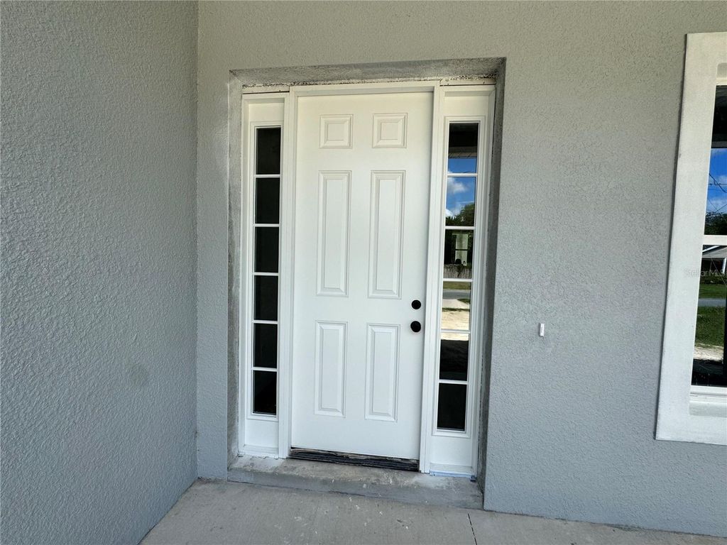 Photo of 902 SW 2nd Street, Ocala, FL 34471 (MLS # OM711748)