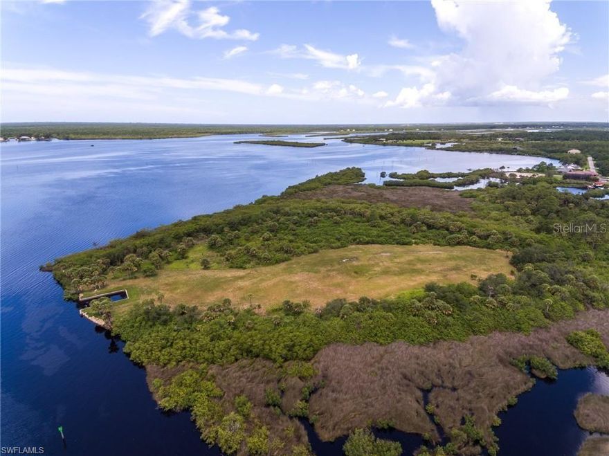 You've found it! One of the last and most unique waterfront properties with acreage left in SW Florida. 31 acres with waterways on 3 sides. The Apollo waterway, the Venus waterway, and the Myakka River. The boating opportunities are endless, the views are breathtaking, and the sunsets are incredible. This property is surrounded by water or wetlands and could be it's on a private compound. Or could be subdivided into 8 waterfront estate lots between 3 & 5 acres each. The property is zoned RSF 3.5, so a replat could yield higher density. Call today for additional info...
