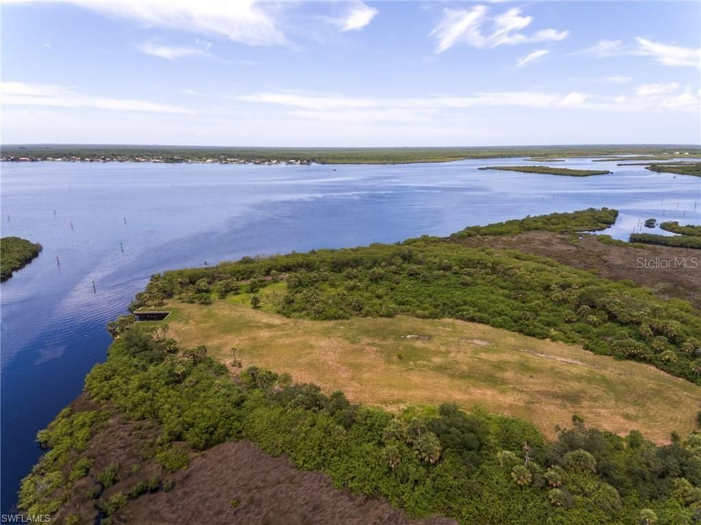 Photo of 12477 Eisenhower Drive, Port Charlotte, FL 33953 (MLS # A4654455)