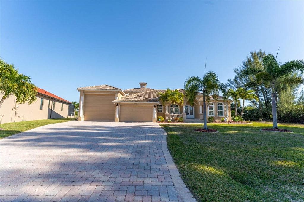 Photo of 10544 Poughkeepsie Circle, Port Charlotte, FL 33981 (MLS # TB8468035)