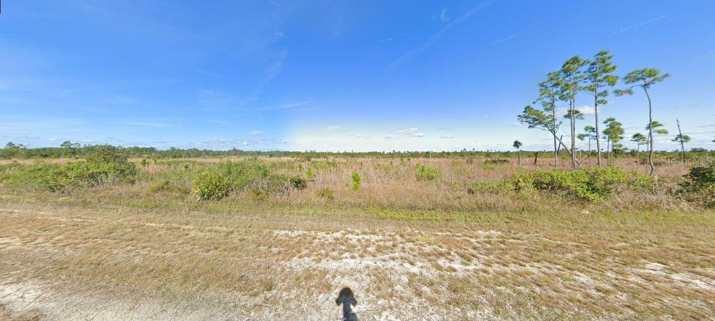 Photo of 508 Portulaca Drive, Indian Lake Estates, FL 33855 (MLS # O6229450)