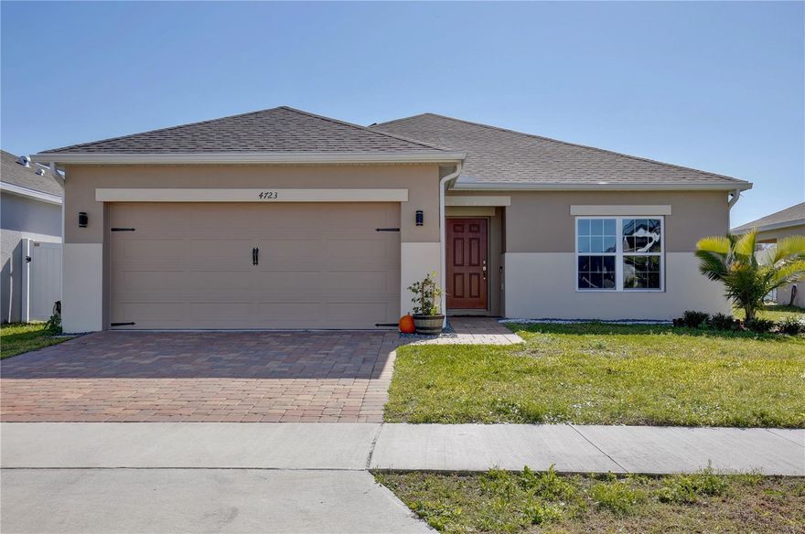 Don't miss this incredible opportunity to rent a beautiful 3-bedroom home in a prime location. Located directly across from the community amenities. This home offers great curb appeal with a two-car garage and paver patio. Inside, you'll find a bright, open layout with tile flooring, neutral tones, and plenty of natural light. The kitchen features shaker cabinets, stainless steel appliances, a decorative backsplash, recessed lighting, a pantry closet, and a center island with bar seating, all overlooking the spacious living and dining areas. Sliding glass doors lead to a large backyard with a fire pit and direct access to the community pool. The primary suite includes dual vanities, a walk-in closet, a private water closet, and a glass-enclosed shower with floor-to-ceiling tile and a rainfall shower head. The guest bathroom also features dual sinks and a private tub/shower combo. A dedicated laundry room with shelving comes equipped with a GE washer and dryer for added convenience.
Conveniently located off South Poinciana Blvd near Valencia College, Publix, Walmart, dining, and entertainment. With resort-style amenities, a spacious layout, and a prime location, this home is move-in ready. Schedule your showing today!