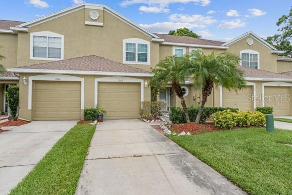 Photo of 11162 Kapok Grand Circle, Madeira Beach, FL 33708 (MLS # TB8382950)