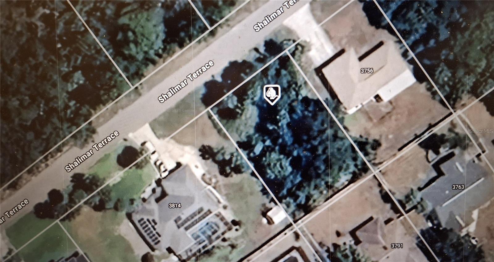 Prime vacant lot on Shalimar Ter. This buildable residential lot offers a great opportunity for your new home or investment property in a growing area. Located in a peaceful neighborhood, it is conveniently close to major roadways, shopping, dining, schools, and local attractions, including the Atlanta Braves Spring Training Stadium and pristine Gulf Coast beaches. The property is not in a flood zone and is in a desirable area with a mix of new and established homes.