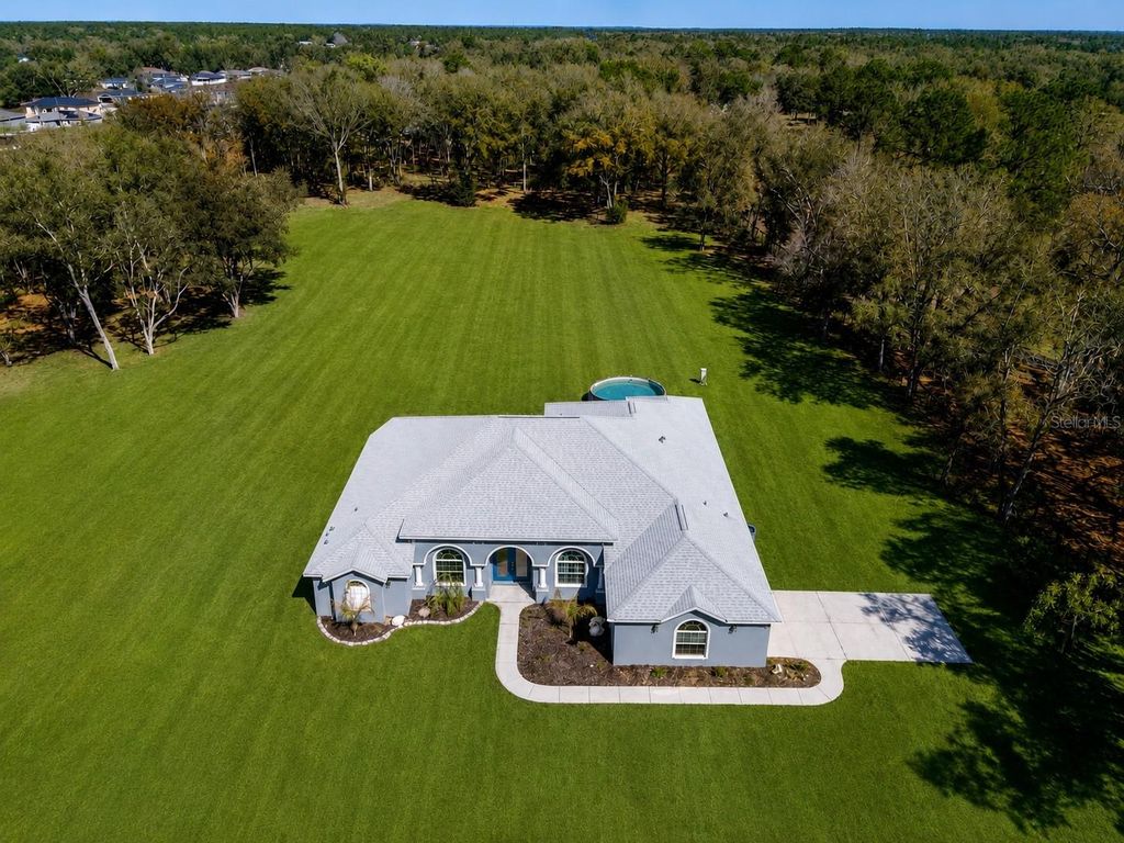 Photo of 10688 SW 129th Terrace Road, Dunnellon, FL 34432 (MLS # OM725310)