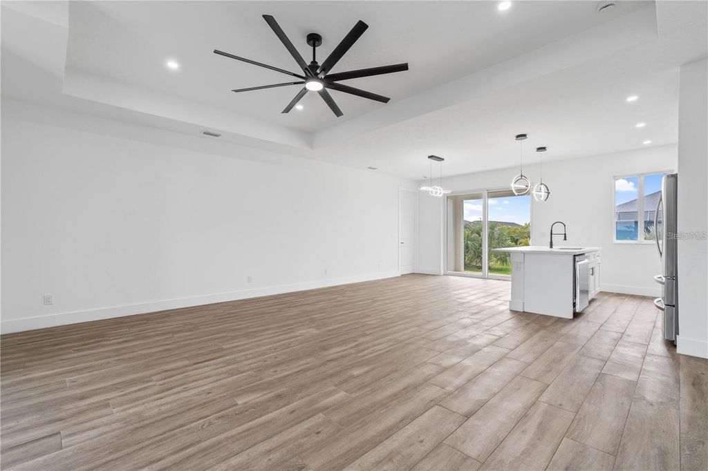 Photo of 10071 Kingsville Drive, Port Charlotte, FL 33981 (MLS # O6320279)