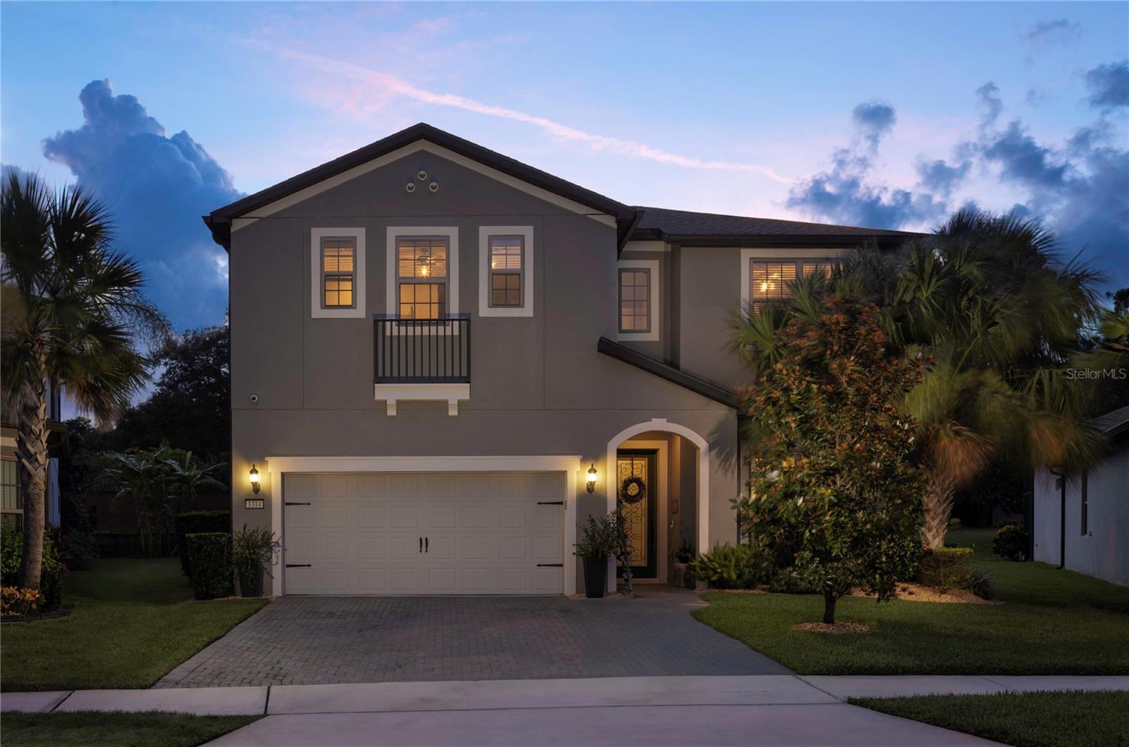 Nestled behind the gates of Lake Emma Sound resides 1314 Patterson Terrace, an impeccably styled home offering a luxurious lifestyle and a rare, open backyard beyond the screen pool enclosure. Designer wood floors, crown molding, and a neutral color palette coalesce into an inviting atmosphere the new owners will enjoy for a lifetime. This four-bedroom, three full and one-half bath residence boasts an office, a versatile bar space, and a large loft. Chef’s will enjoy KitchenAid RED appliances including wall ovens and a natural gas cooktop. Energy-efficient features include Low-E double-pane windows and doors, tankless gas water heating and more. The owner's suite enjoys beautiful views of the expansive backyard and a luxurious bath with a large walk-in shower. Venture upstairs into the loft, providing great flex space for the additional three bedrooms located on the 2nd floor along with two additional baths. Near acclaimed medical centers, boutique shopping, and top-rated golf and country clubs, with effortless access to Orlando, Winter Park, and Central Florida’s renowned attractions and beaches, this is luxury redefined in the heart of Lake Mary.