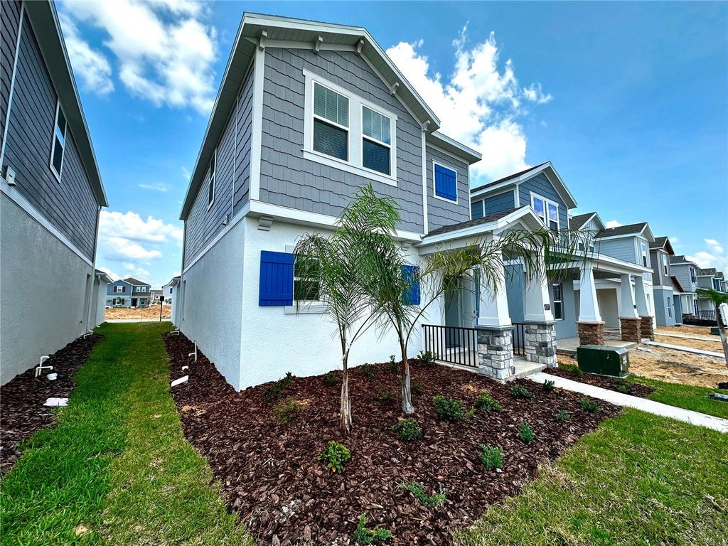 Photo of 6095 Wellbeing Way, Clermont, FL 34714 (MLS # O6432367)