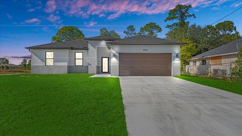 Photo of 1015 Merry Street E, Lehigh Acres, FL 33974 (MLS # A4677711)