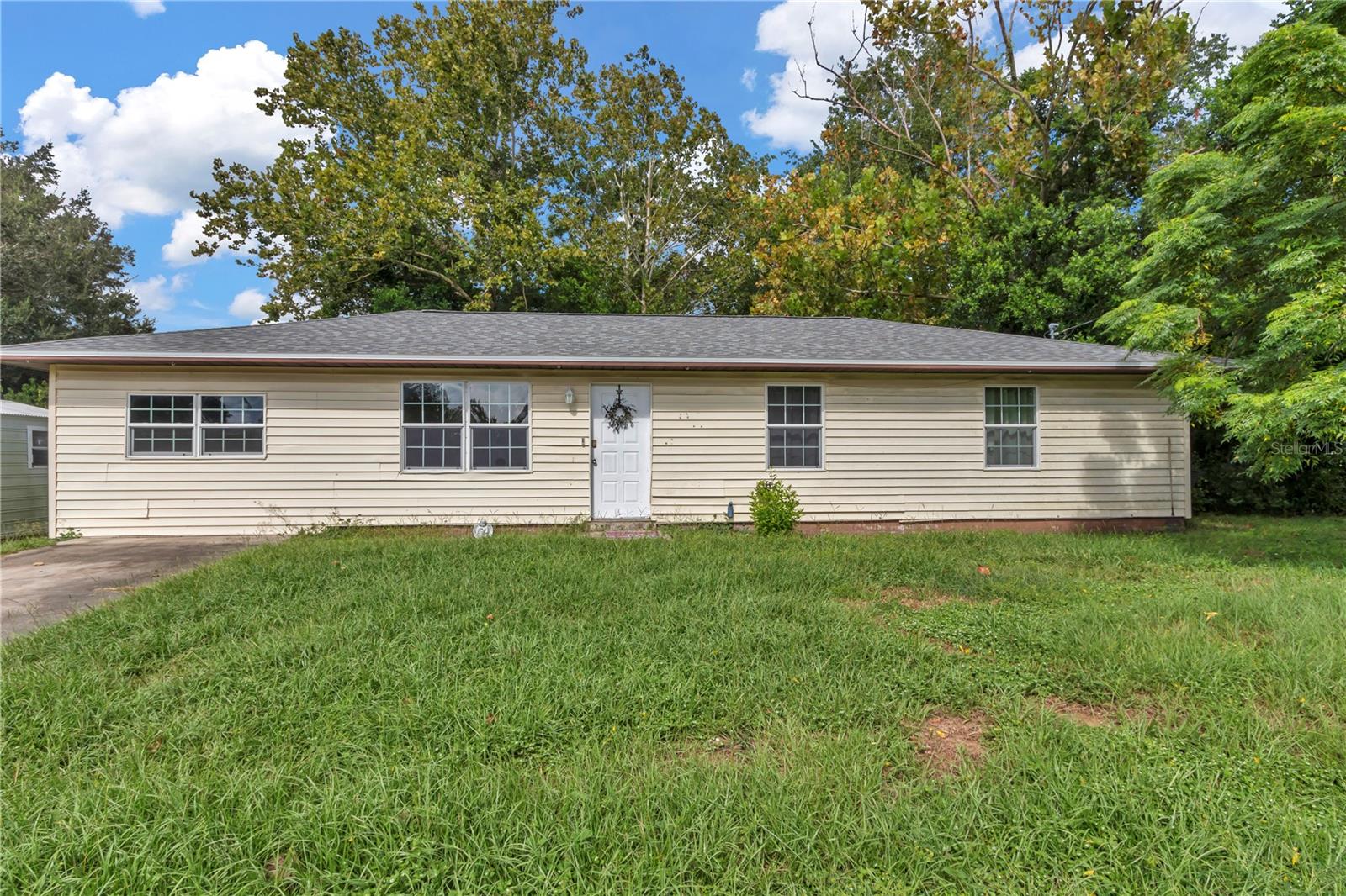 Sold as is in NW Ocala with major systems already taken care of. This 1983 block-construction 4BR/2.5BA offers 1,375 sq ft with a smart split layout and a primary suite featuring a renovated bath (~2021) with jetted tub. Big-ticket items are recent: new roof (Dec 2024), new well tank (Feb 2024), and new water heater (Apr 2024). Bring your design ideas and create instant value great fit for buyers seeking a blank canvas or investors planning their next project. Well & septic.