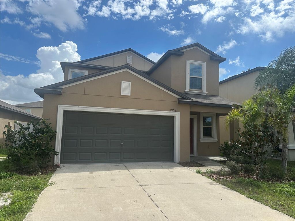 Photo of 7157 Samuel Ivy Drive, Tampa, FL 33619 (MLS # O6391385)