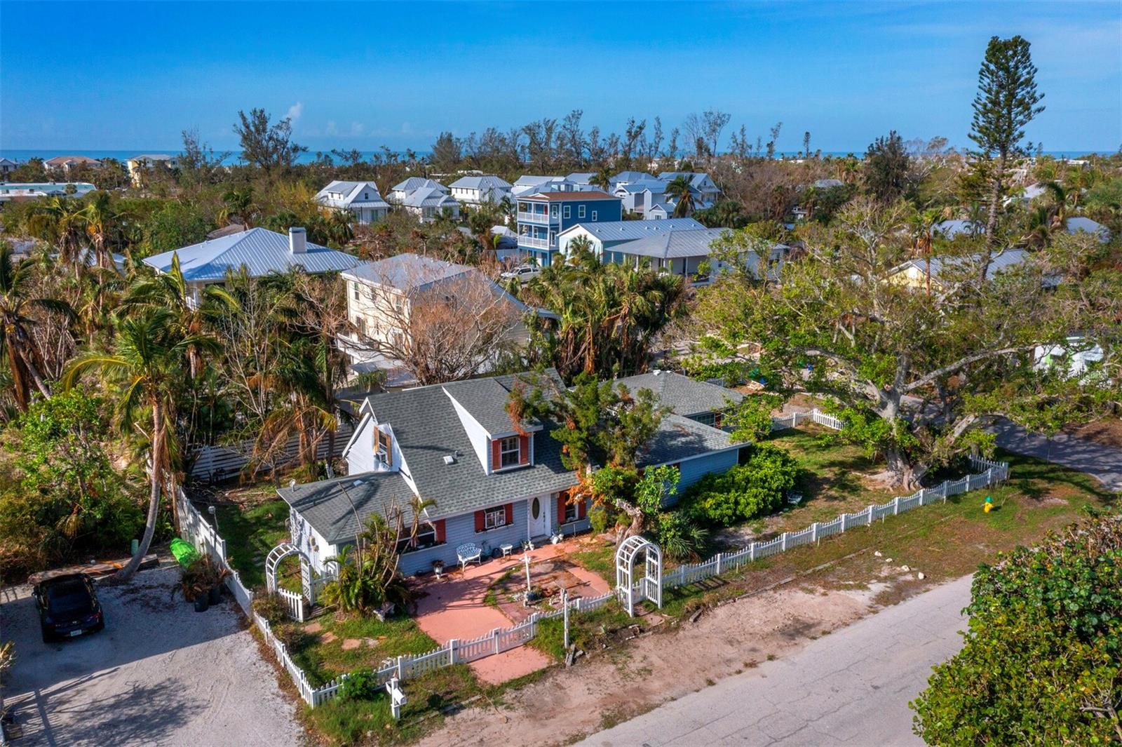 This oversized 9,000 sq. ft. corner lot in the historic Village of Longbeach offers a prime opportunity for development, located in the peaceful southeastern corner of the village. Measuring 75ft x 120ft, the property is just moments from popular spots like Shore Restaurant, Mar Vista, and Whitney's, with Whitney Plaza nearby offering additional dining, shopping, and nightlife options. The sought-after community dock, featuring running water, a fish cleaning station, and a boat ramp, adds further appeal to this exceptional location.