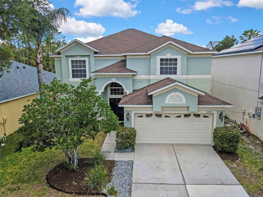 Welcome to this spacious two-story home set on a serene pond and conservation lot, offering privacy and natural views.

The eat-in kitchen features sleek granite counters, abundant cabinetry, and generous workspace — perfect for everyday cooking or entertaining. The adjoining family room includes sliding doors that open to an enclosed, covered lanai, extending your living space outdoors.  Formal areas include living room and dining room.

A guest bedroom and full bathroom are conveniently located on the first floor, ideal for visitors or multigenerational living. Upstairs, you’ll find five additional bedrooms, including the master suite with a double vanity and walk-in shower. All grout throughout the home has been professionally cleaned and re-stained, giving the interior a refreshed, move-in-ready feel.  NEW roof in 2020.

Located in Heritage Isles, a gated golf course community, residents enjoy resort-style amenities including a sparkling pool, clubhouse, café, tennis courts, and more.